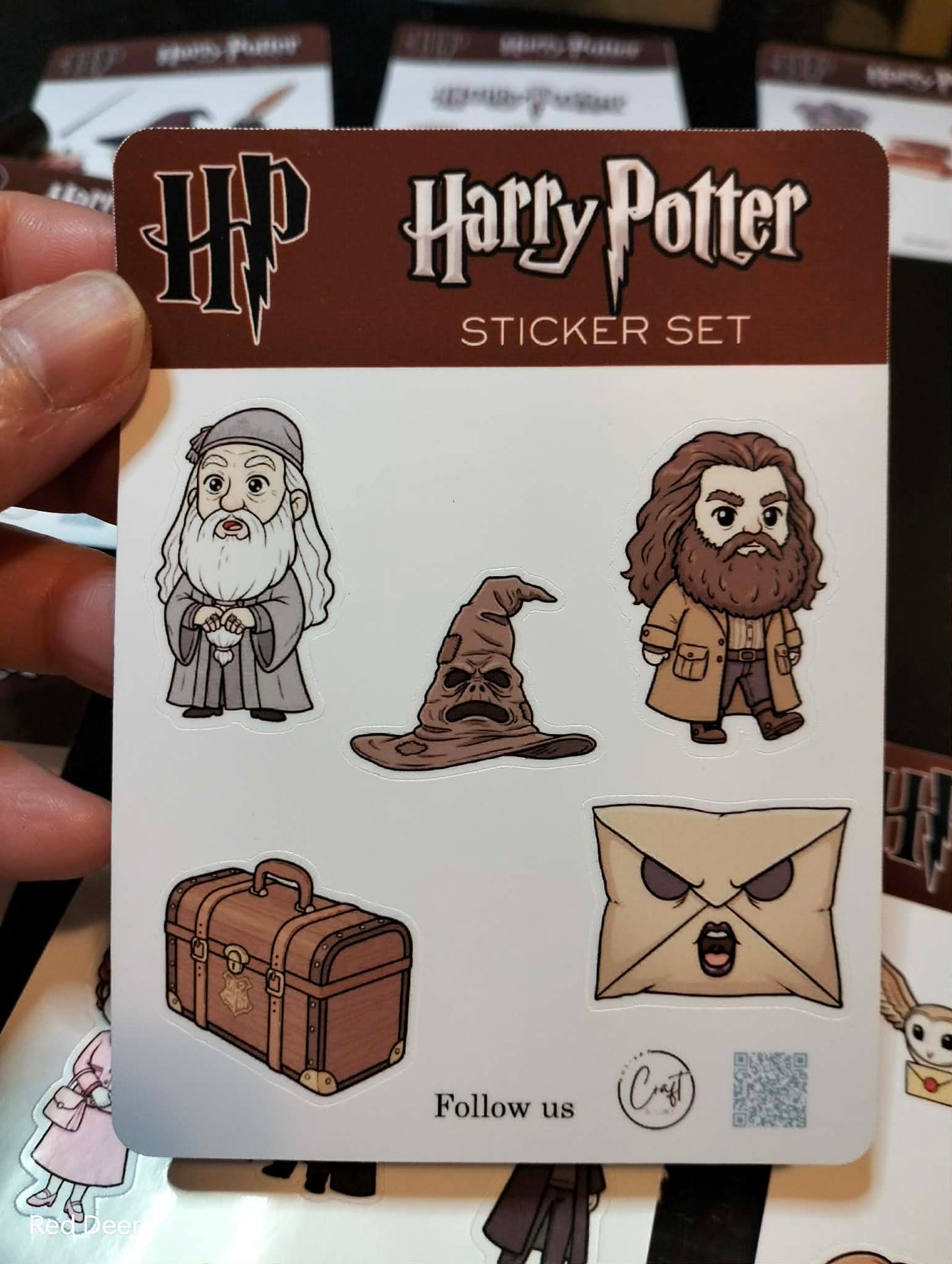 Harry Potter sticker set packaging with characters and a suitcase on a white background.
