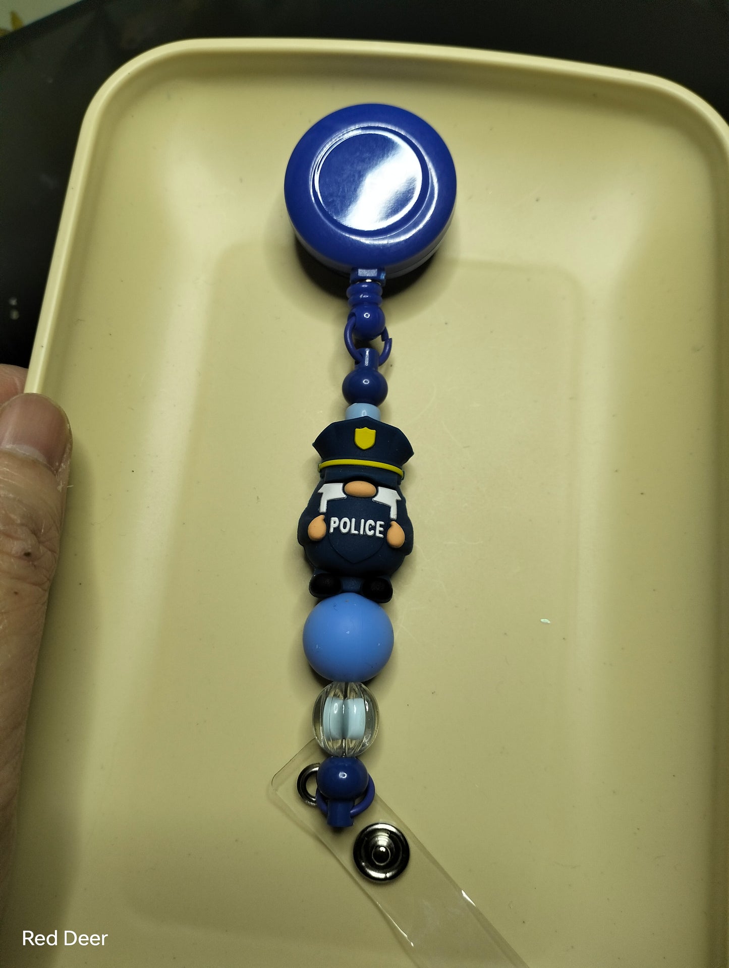 Police beaded badge